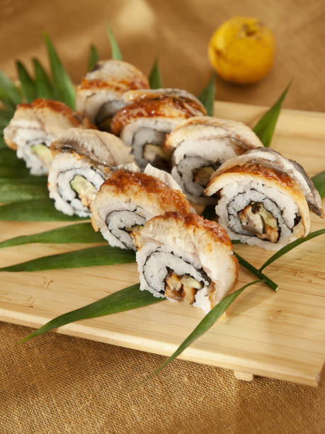 istock Decorative composition with sushi, Japanese seafood 1219570972