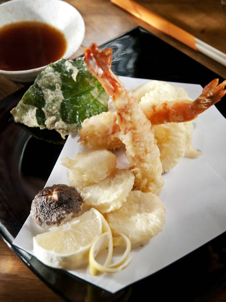 istock scallop, shrimp, squid, vegetable and sauce appetizer 1219572579