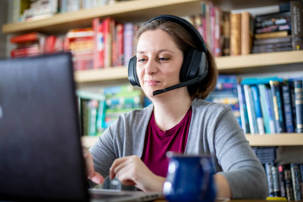 istock Beautiful young woman working from home 1219572623