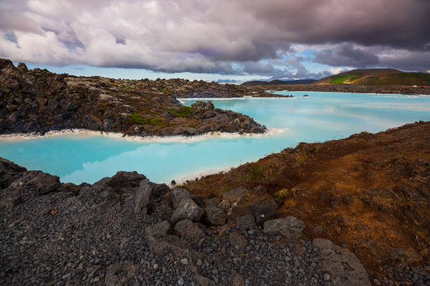 istock Blue lagoon under a charged sky 1219576491