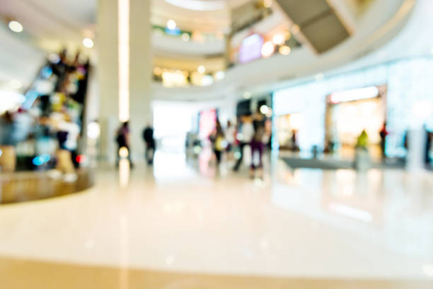 istock Defocused blurred background of modern shopping mall 1219577159