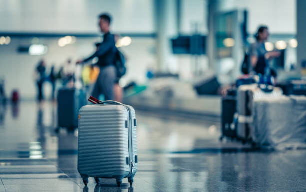 Holiday Photo Luggage Bag At Airport Terminal taxiway stock pictures, royalty-free photos & images