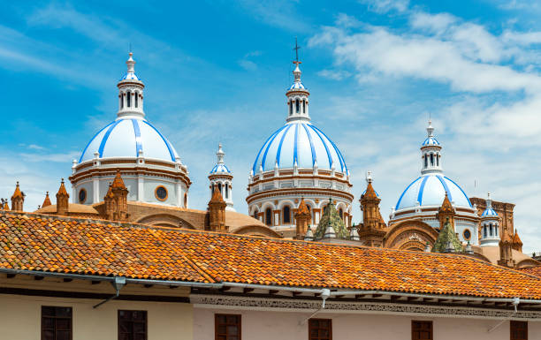 Cathedral Domes, Cuenca, Ecuador Domes of the New Cathedral with mosaic tiles in Cuenca on a summer day, Azuay Province, Ecuador. cuenca ecuador stock pictures, royalty-free photos & images