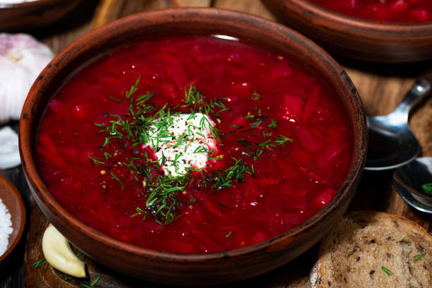istock traditional russian dish borsch with sour cream and fresh dill 1219580264