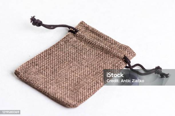 Burlap Jute Drawstring Gift Jewelry Pouches Bag Isolated Above White Marble  Stone Stock Photo - Download Image Now - iStock