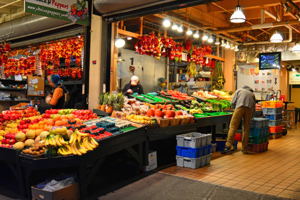Fresh vegetable mushroom beans corns cobs carrots at stall in public market