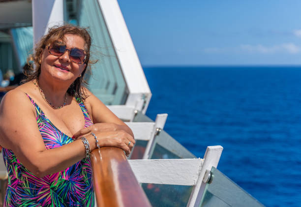 istock Senior Hispanic woman at sea 1219584683