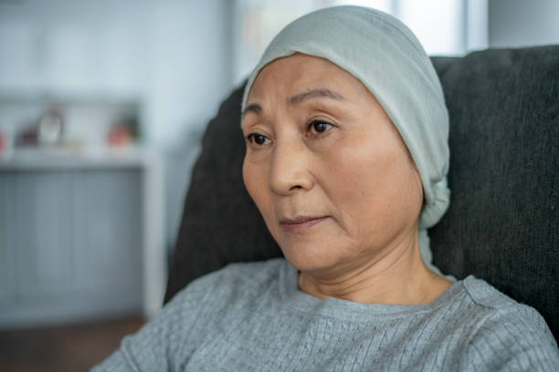 istock Asian woman with cancer 1219588093
