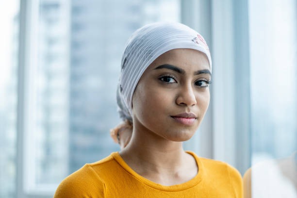 istock Young oncology patient contemplates life 1219589119