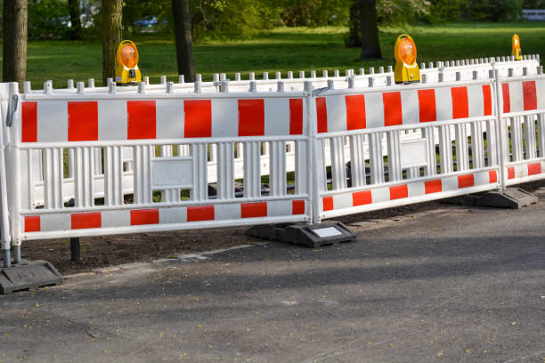 istock A lot of construction site with barriers and lights in a park 1219589783
