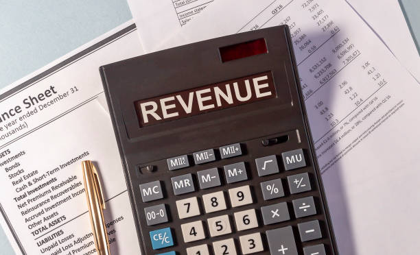 istock A calculator with the word Revenue on the display on documents 1219592538