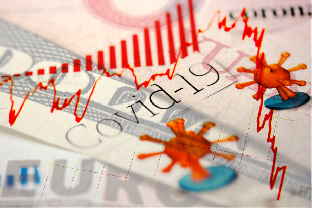 istock Covid-19 headlines and banknotes 1219594144