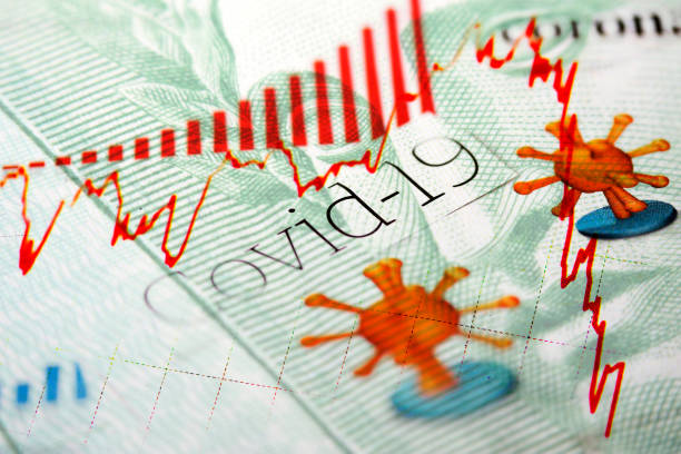 istock Covid-19 headlines and Brazilian banknote 1219594246