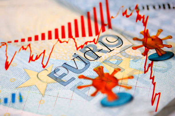 istock Covid-19 headlines and Euro banknote 1219594371