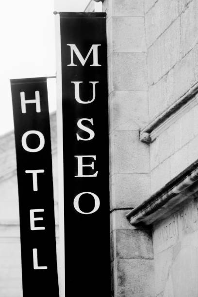 istock Museum and hotel signs on stone building facade. 1219595580