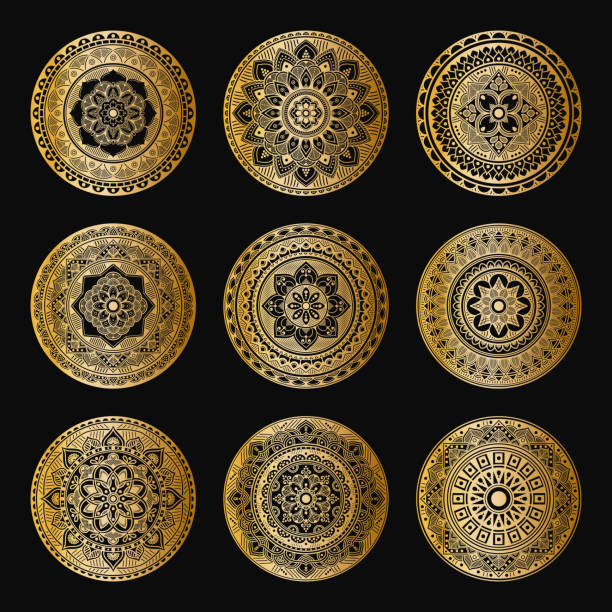 istock Set of decorative ethnic gold ornaments isolated on white. Hand drawn vector mandalas 1219599133
