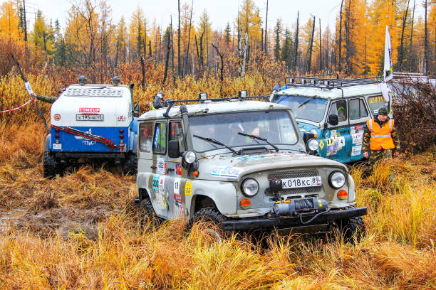 UAZ 3151 Novyy Urengoy, Russia - September 19, 2015: Off-road vehicle UAZ 3151 competes in the annual trophy raid Vesennyaya Rasputitsa. uaz 4x4 land vehicle woods stock pictures, royalty-free photos & images