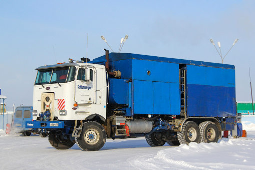 Novyy Urengoy, Russia - March 8, 2014: Schlumberger well service truck Peterbilt 362 in the city street.