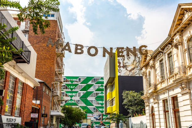 Maboneng banner sign on  street in Johannesburg,South Africa, This pic shows Maboneng sign on  street in Johannesburg.This pic shows lovely Maboneng Precinct of Johannesburg city. This area is rated as One of South Africa's hippest urban districts. The pic is taken in day time. johannesburg photos stock pictures, royalty-free photos & images