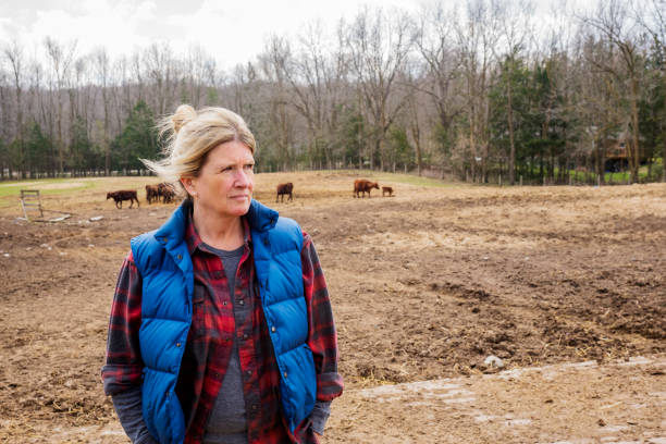 istock A female cattle farmer outside in a pasture 1219604403