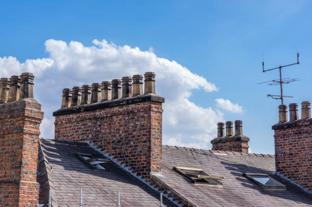 istock Chimney Pots on a roof line 1219604593