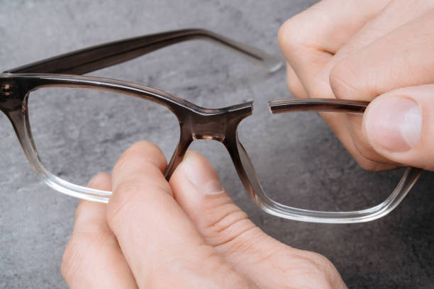 istock Broken glasses ribs in man's hands 1219604597