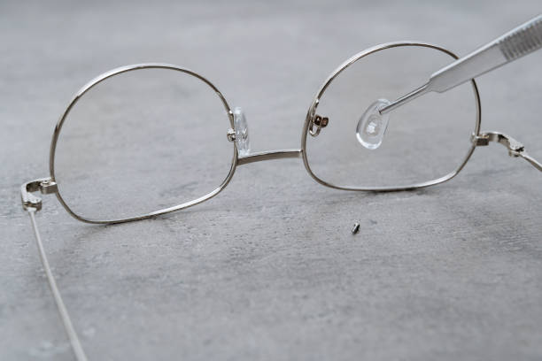 istock Glasses repairing and manufacturing in optician workshop 1219605145
