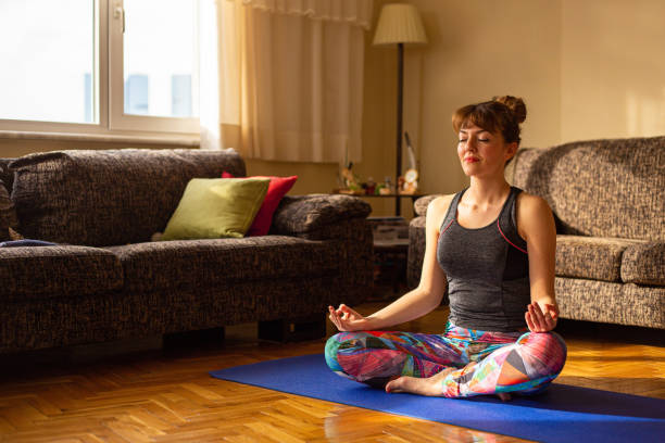 istock Young Girl meditating 1219605582