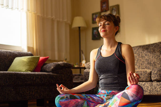 istock Young Girl meditating 1219605746