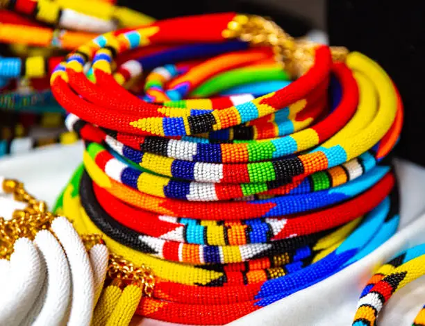 This pic shows Colorful handmade african Jewelry put out on sale in local street market in South Africa. The pic shows close up of  Colorful handmade african Jewelry.  The pic is taken in South africa in march 2019.