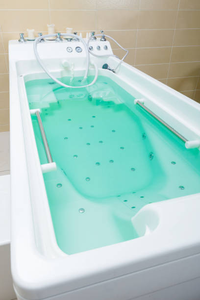 istock beautiful and white hot tub filled with water 1219609015