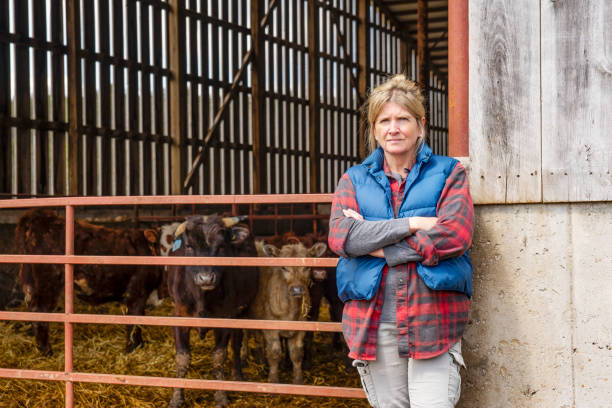 istock A female cattle farmer outside if a barn 1219613978