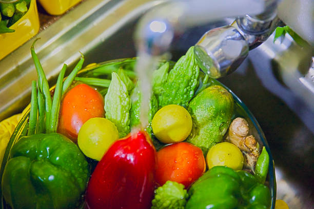 istock Disinfecting vegetables during COVID-19 coronavirus outbreak. 1219614688