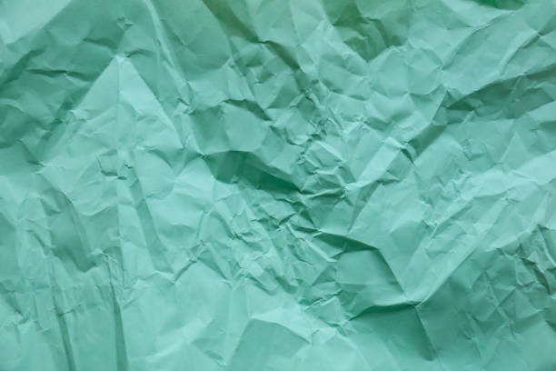 Texture of green crumpled paper
