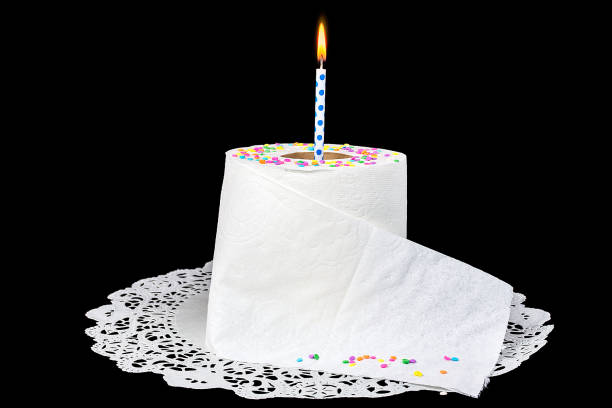 istock birthday candle in white toilet paper roll 1219615811