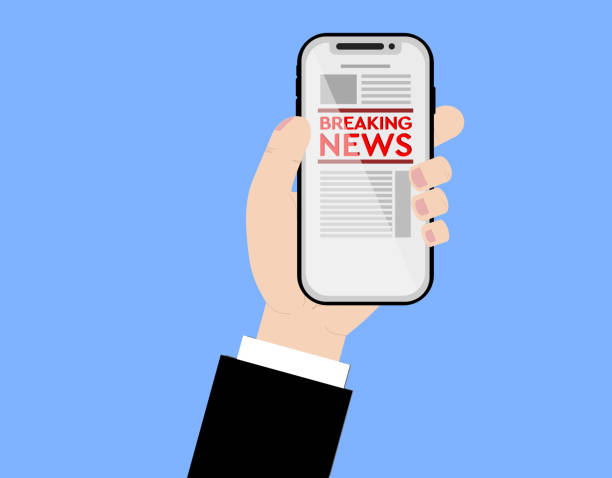 istock Business man holding a smartphone, looking at breaking news vector illustration. 1219623071