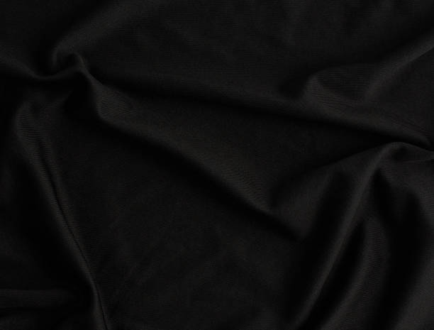 istock texture of black cotton fabric with waves, full frame, fabric for sewing clothes, shirts 1219623871
