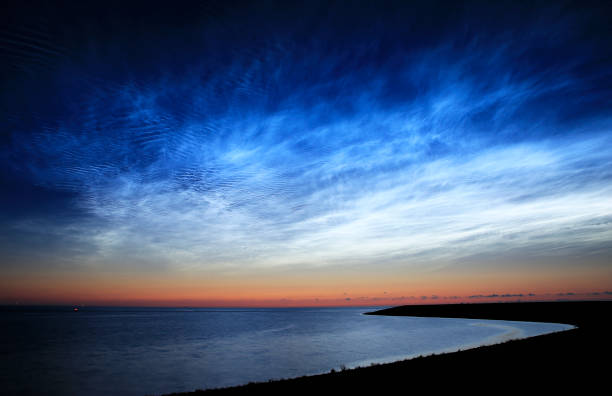 Noctilucent clouds stock photo