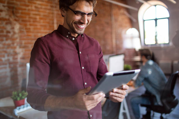 istock Keeping up with all his connections 1219627449