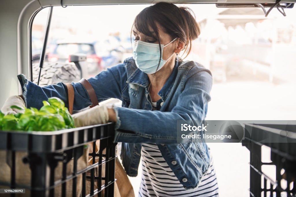 Mature woman shopping grocery Mature woman shopping grocerie.  Quebec, Canada Food Stock Photo
