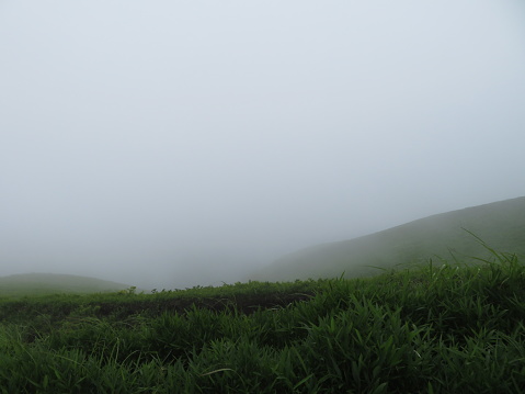 Foggy and unclear layers of hills in Aso, Kumamoto