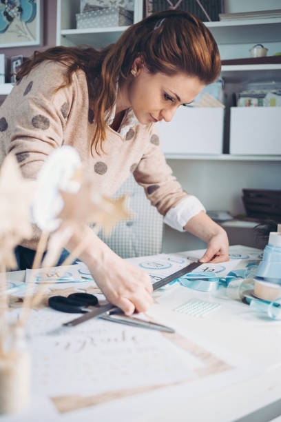 istock Young designer measuring supplies 1219631967