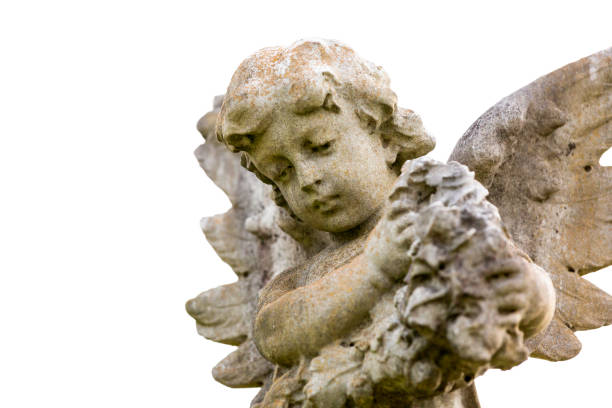istock Angel, old statue of little angle, white  background with copy space 1219632951