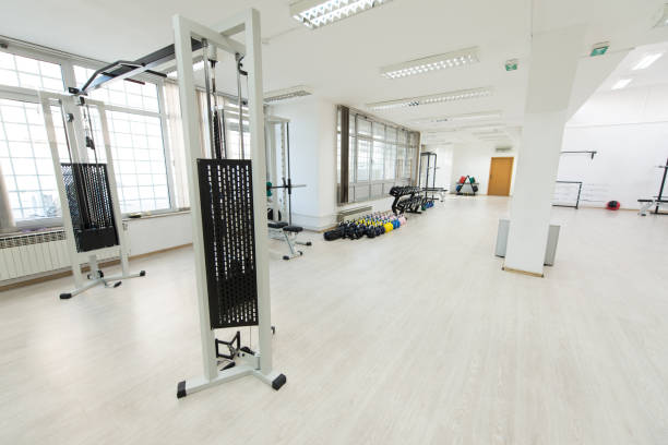 istock Large Modern Gym With Workout Equipment 1219641094