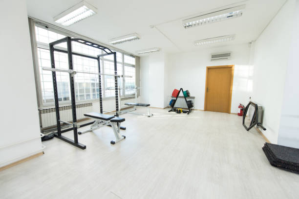 istock Large Modern Gym With Workout Equipment 1219641099