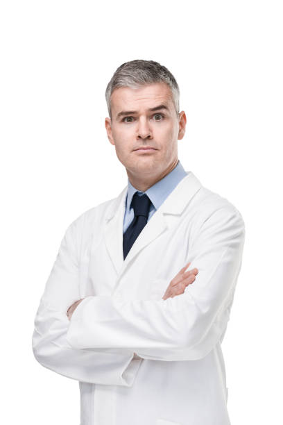 istock Confident doctor staring intently at the camera 1219641354