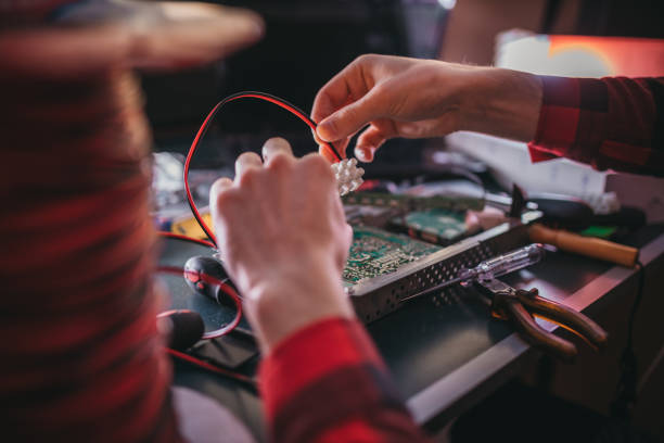 IT technician repair the board in the lab