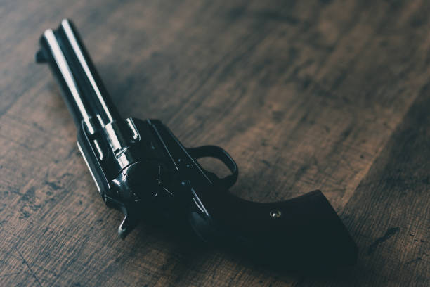 istock Old black revolver gun 1219648476