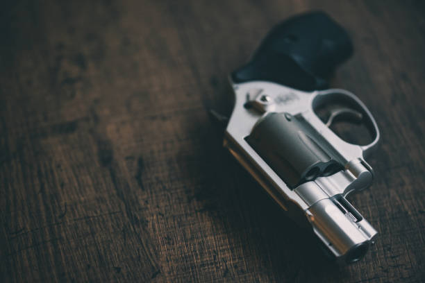 istock Small silver revolver gun 1219649188