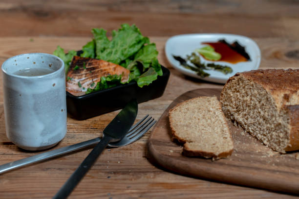 istock baked salmon, fresh lettuce and country bread 1219657974